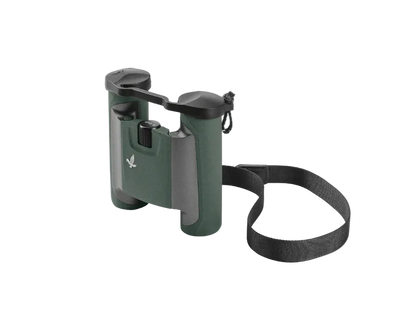 Green binoculars with a black strap on a light gray background